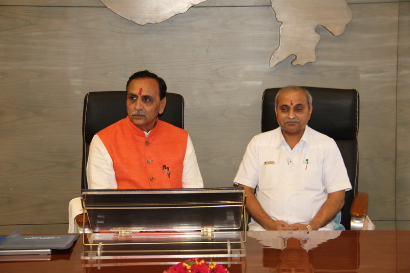 Ministers led by CM Rupani pay courtesy visit to Gujarat Governor
