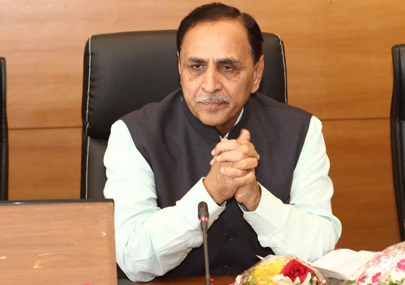 Rupani allocates portfolios to four ministers